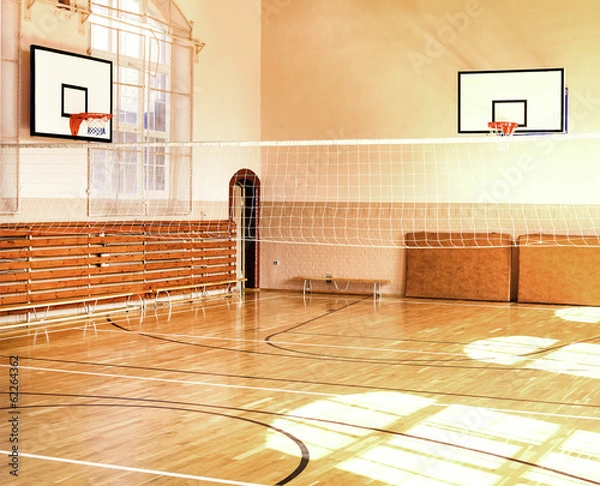 Obraz Pusta sala gimnastyczna z tablicami do koszykówki