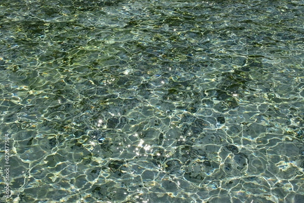 Fototapeta waved water in basin - attractive surface - background