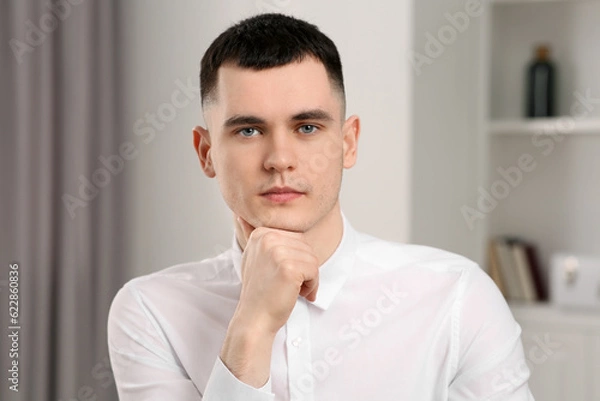 Fototapeta Young man having online video call at home, view from web camera