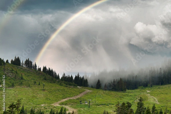 Fototapeta rainbow over the mountains at snoqualmie pass
