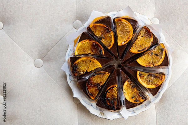 Fototapeta Top View of burned Orange chocolate topped with burned orange slices