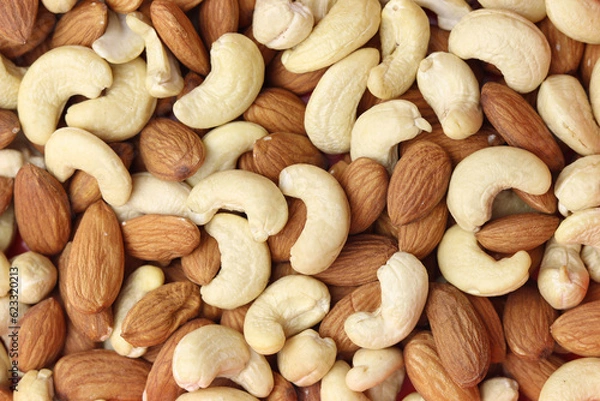 Fototapeta Top angle shot of Almonds and cashew nut. Close up of Almonds and cashew nut.Prunus dulcis and Anacardium occidentale