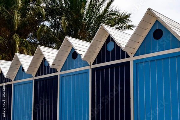 Obraz beach huts at the sea