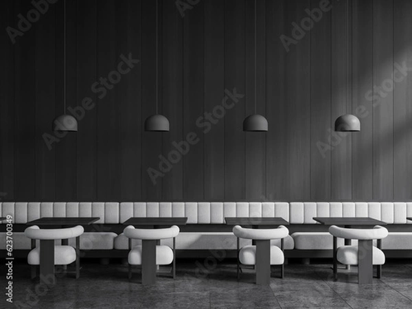 Fototapeta Dark cafe interior with armchairs and sofa, eating space with table and lamps
