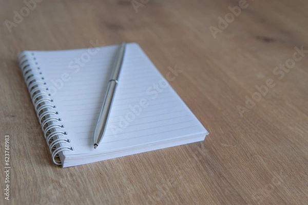 Fototapeta notebook and pen close up