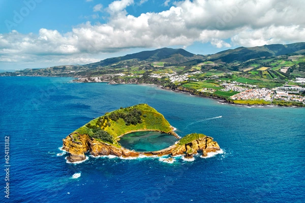 Obraz Aerial shot, drone point of view of picturesque Islet of Vila Franca do Campo. Sao Miguel island, Azores, Portugal. Heart carved by nature. Bird eye view. Travel attraction and natural wonders concept
