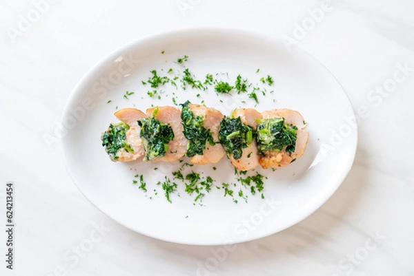Fototapeta Chicken breasts stuffed with spinach and cheese