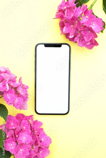 Fototapeta Blank phone screen mockup for digital invitation, design, 
presentation, flat lay with pink  hydrangea flowers, smartphone template for electronic card. . Top view, copy space for text, product place.