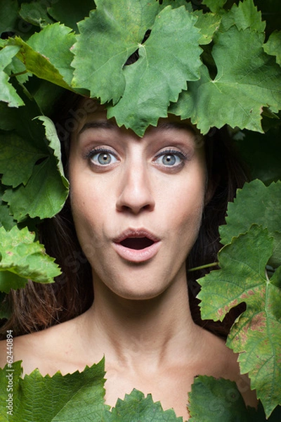 Fototapeta portrait of young beautiful women in leafs
