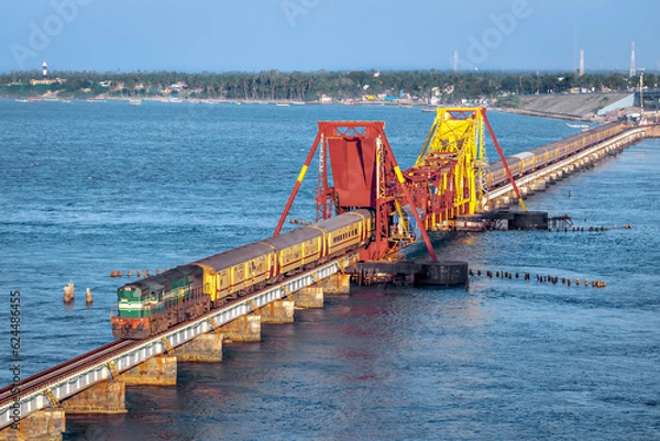 Fototapeta Rameshwaram to Chennai Boat Mail express train crosses 2 kilometers long Pamban sea railway bridge, India