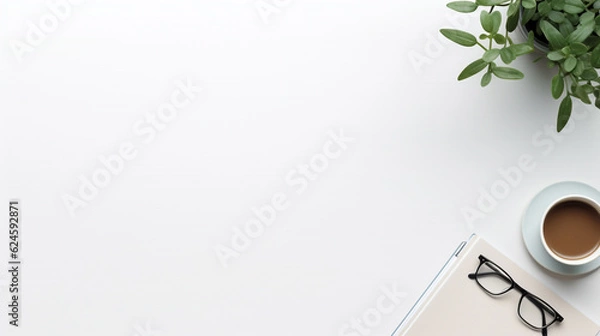 Obraz White office desk with plant, glasses, and notebook. Top view with copy space. Flat lay