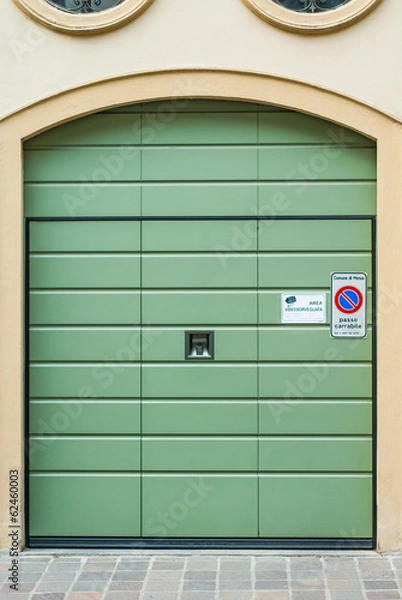 Obraz Porta garage verde, basculante