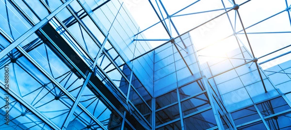 Obraz Low angle view of modern glass office building interior