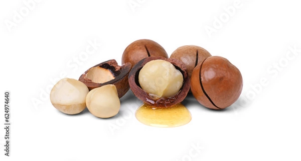 Fototapeta Delicious organic Macadamia nuts isolated on white