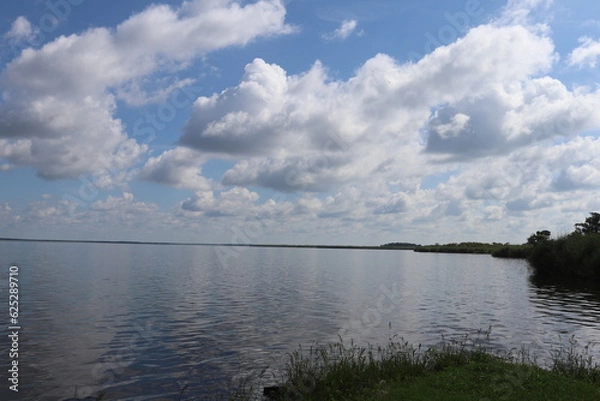 Obraz Cloudy sky on a river
