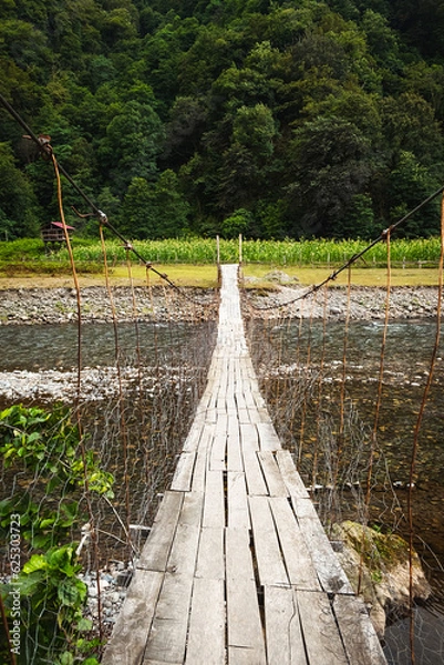 Obraz  Bridge over a mountain river in Georgia. 