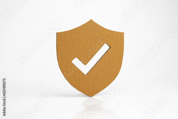 Fototapeta Paper cut of security shield with check mark on white background.