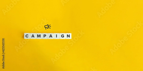 Obraz Campaign banner and conceptual image. Block letter tiles on bright orange background.