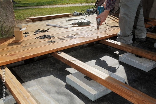 Fototapeta Constructing a wooden patio