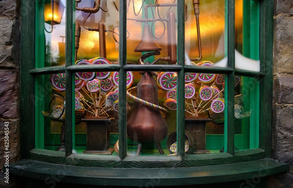 Fototapeta delicious colorful lollipops in a vintage showcase window