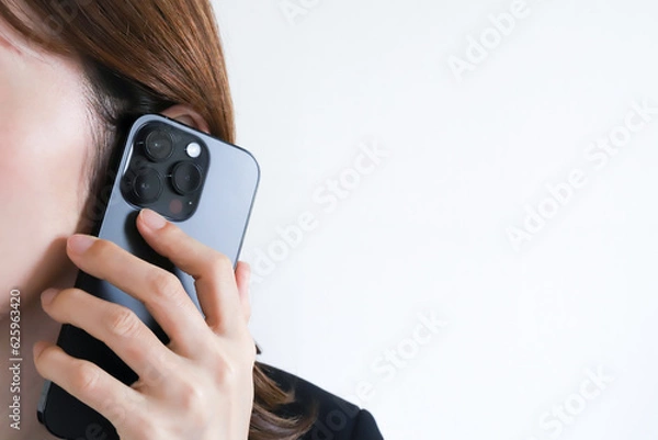 Fototapeta 電話で話す女性