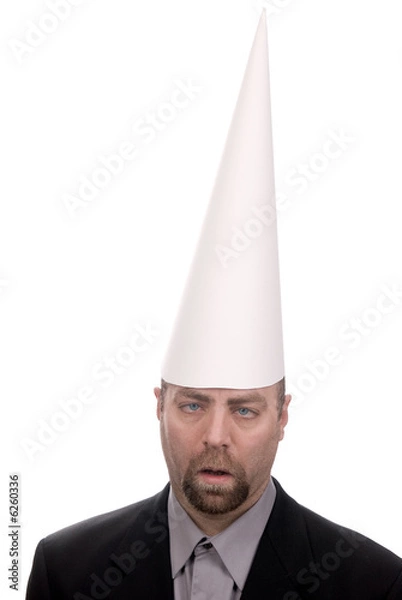 Obraz Man in a dunce cap with eyes crossed over a white background