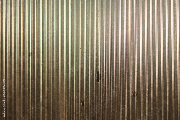 Fototapeta The sun is setting, and the light is showing through the plastic.