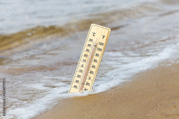 Obraz Thermometer on the sandy beach

