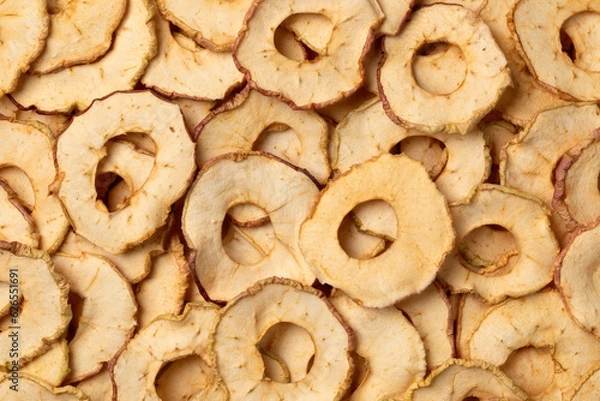 Obraz Dried apple chips full frame close up as background