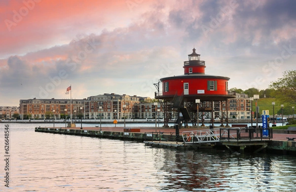 Obraz Seven Foot Knoll Lighthouse in Baltimore’s Inner Harbor at sunset, . This famous screwpile style lighthouse once stood watch atop Seven Foot Knoll in the Chesapeake Bay, Baltimore Maryland