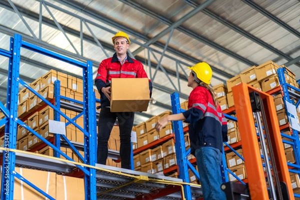 Fototapeta Engineer team cargo shipping order on tablet export and import, goods, factory ,warehouse ,international trade ,transportation ,cargo ship ,logistic, distribution at logistics center.business industry
