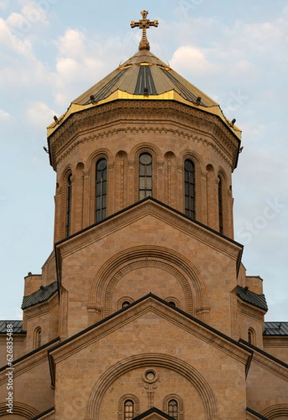 Fototapeta Golden dome of the Holy Trinity Cathedral of Tbilisi Tsminda Sameba in Georgia