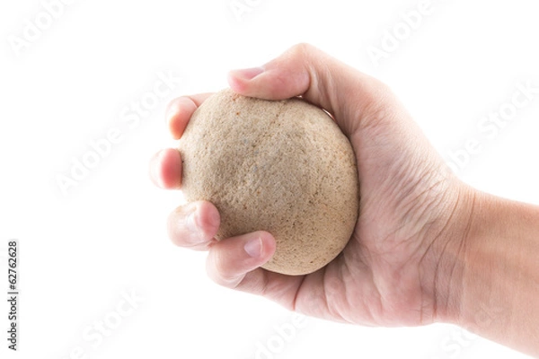 Fototapeta Izolowany dłoni trzyma kamień w spa na białym backgro