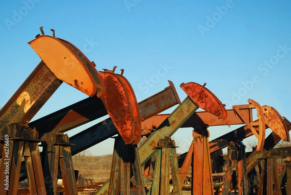 Obraz  Used pump jacks are for sale.