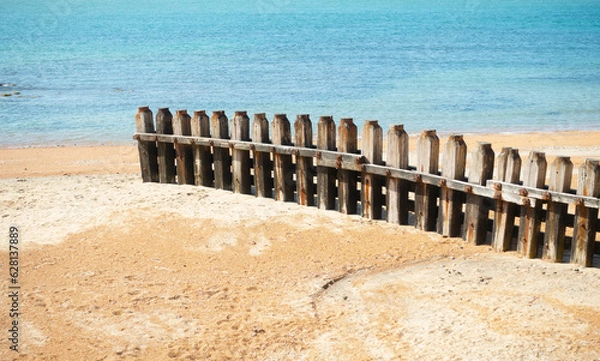 Fototapeta breakwater at the beach