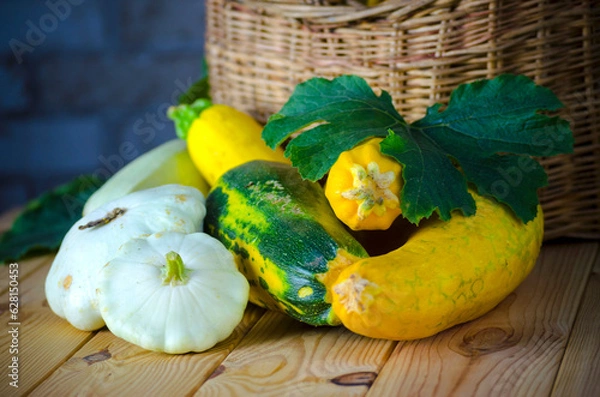 Fototapeta fresh zucchini and squash in a wicker basket