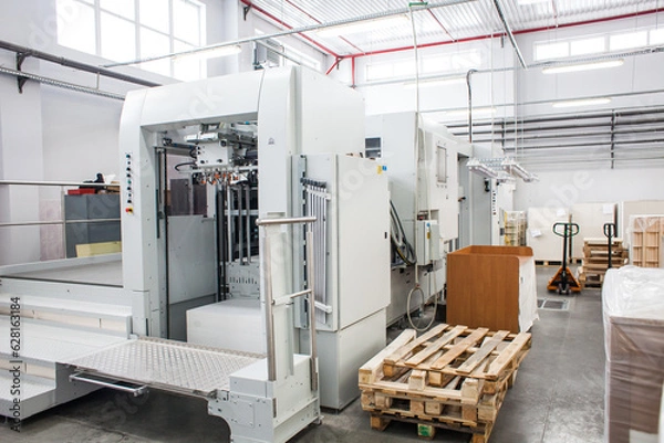 Fototapeta The equipment for a press. Offset machine at the printing manufacturing. Printing machine