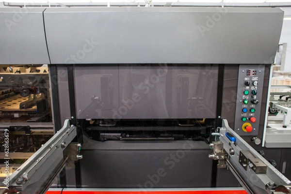 Fototapeta The equipment for a press. Offset machine at the printing manufacturing. Printing machine