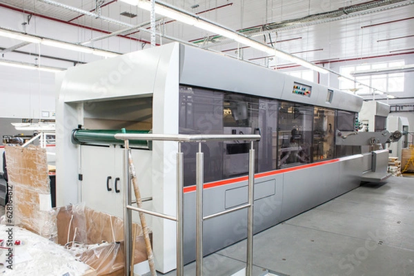 Fototapeta The equipment for a press. Offset machine at the printing manufacturing. Printing machine