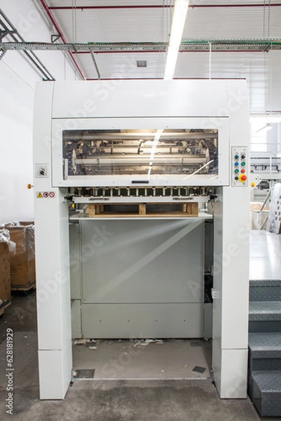 Fototapeta The equipment for a press. Offset machine at the printing manufacturing. Printing machine