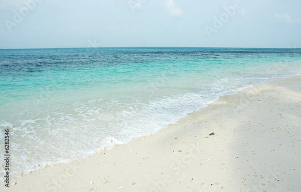 Obraz clean beach with white sand and blue sky