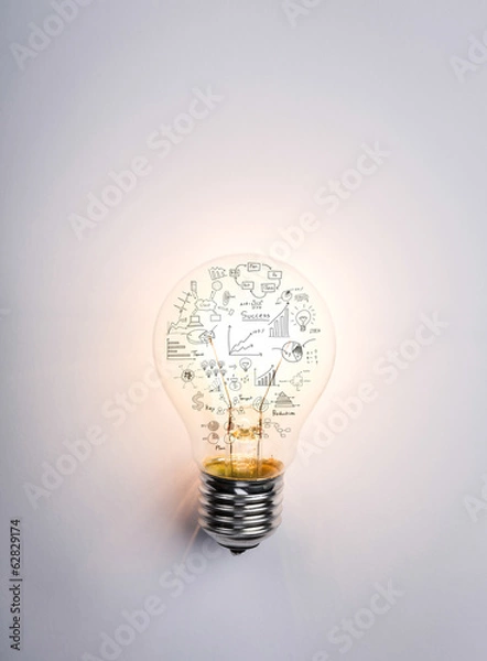 Fototapeta Light bulb with drawing graph