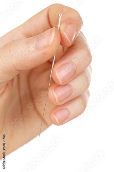 Obraz Hand holding needle for acupuncture