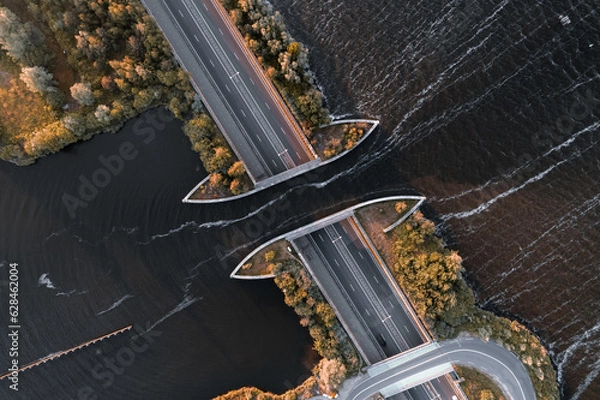Fototapeta Aerial view of boat crossing aquaduct in Harderwijk, Veluwemeer The Netherlands