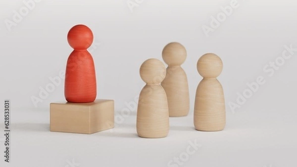 Fototapeta A wooden figure standing with a team to influence and empowerment. Concept of leadership, successful competition winner and Leader with influence and Social distancing for a new normal lifestyle.
