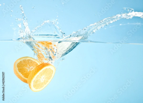 Fototapeta fruits splashed into water