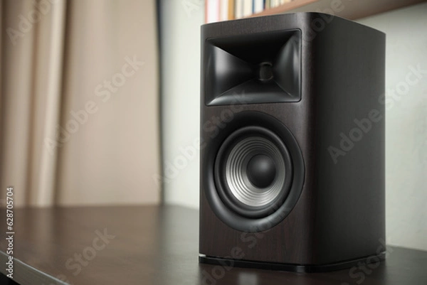 Fototapeta One sound speaker on table indoors. Space for text