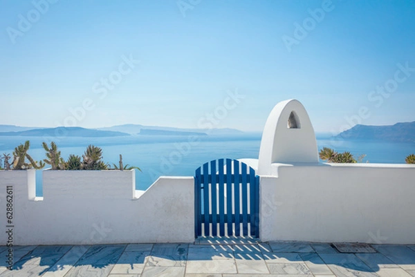 Obraz Conceptual background - Santorini. Greece, Santorini island, Oia - white architecture and the door to heaven. Abstract background, empty space. Greek Islands, Santorini