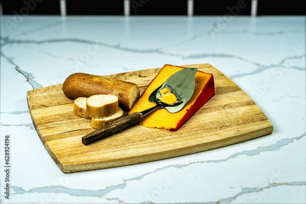 Fototapeta Bread & Cheese on Cutting Board