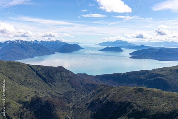 Obraz Aerial photo of a mountain peak near Juneau, Alaska with Gastineau Channel and Stephens passage in the background.